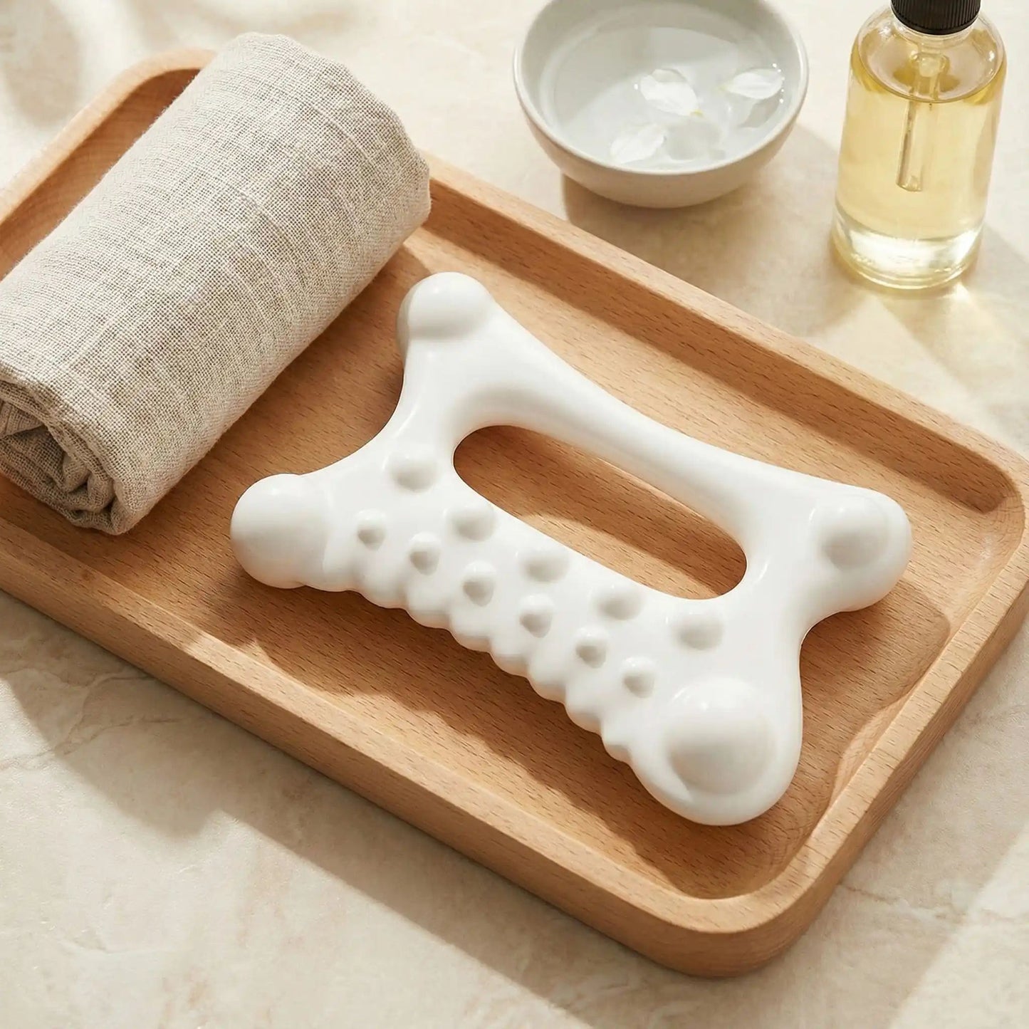 gua sha huile serviette massage