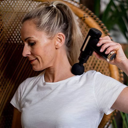 pistolet massage femme detente nuque