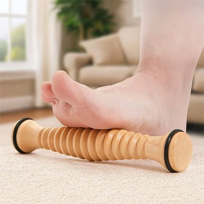 rouleau de massage bois pied