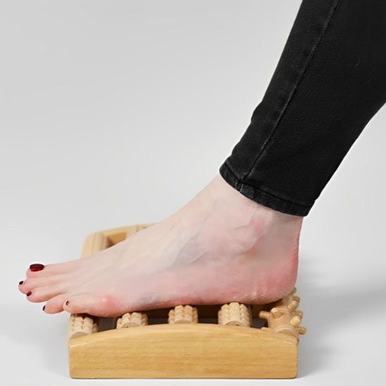 rouleau de massage bois pieds