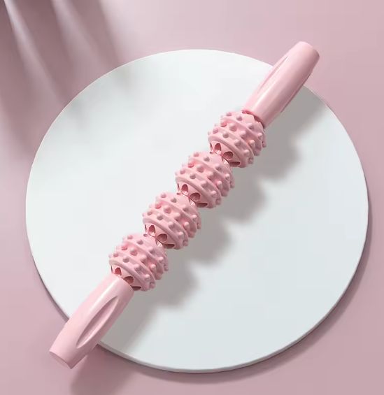 rouleau de massage couleur rose detente