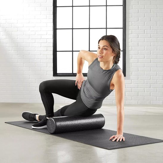 rouleau massage femme salle sport